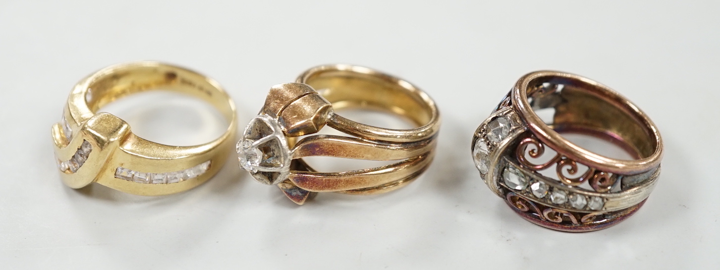 A continental yellow metal and rose cut diamond set cluster ring, with pierced setting, size M and two other yellow metal rings, one set with solitaire diamond, gross weight 25.7 grams.